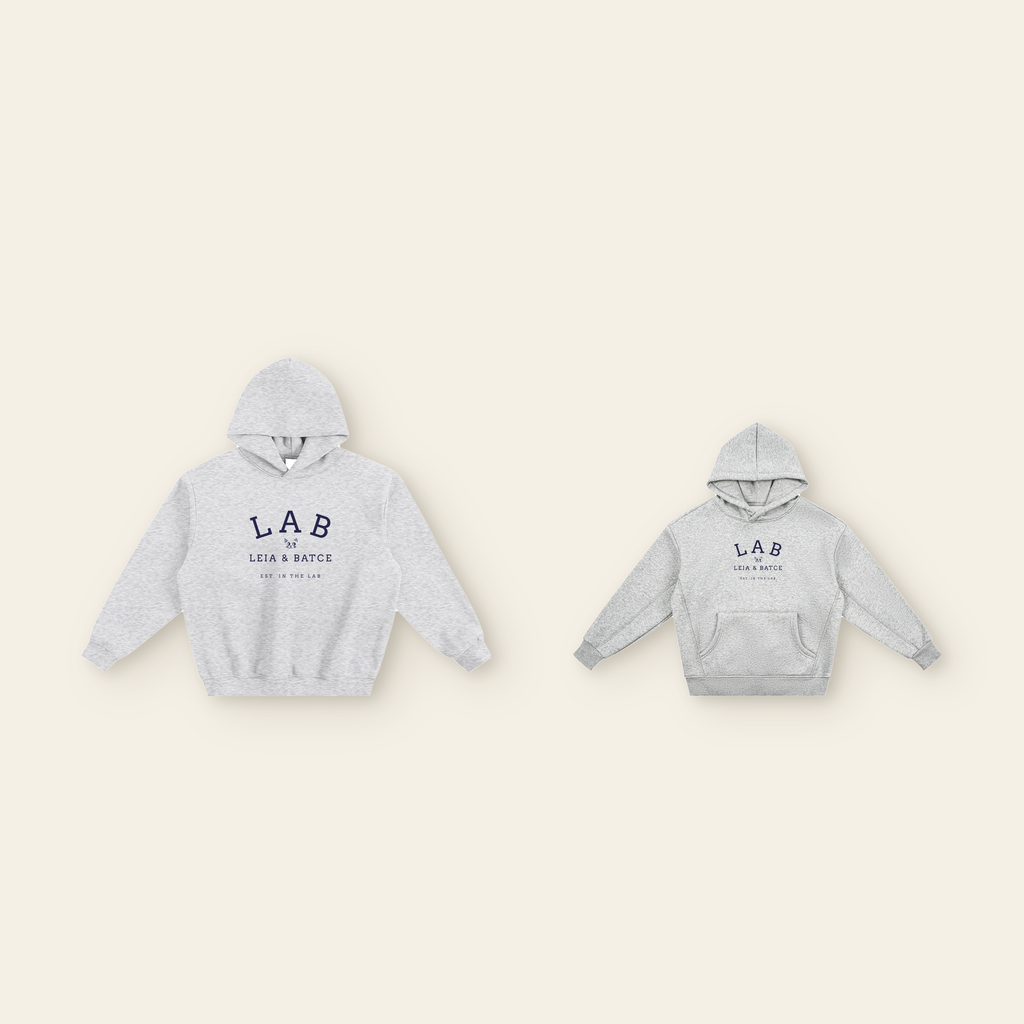 The Batce Lab Fleece Hoodie Pair: one kids' and one adult piece laid side by side, the same design at two sizes