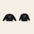 The Cherry on Top Cake Sweatshirt Pair: one kids' and one adult piece laid side by side, the same design at two sizes