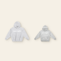 The Just Right Back Wave Hoodie Pair: one kids' and one adult piece laid side by side, the same design at two sizes