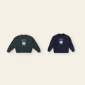 The Just Right Fleece Sweatshirt Pair: one kids' and one adult piece laid side by side, the same design at two sizes