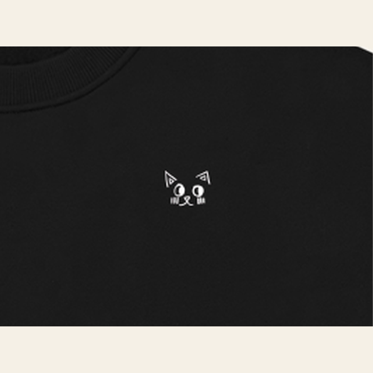 Close-up of the print on the Black adult piece — the kids' piece carries the same design