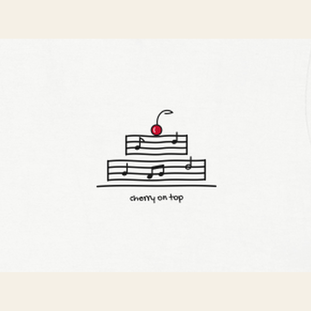 Close-up of the print on the White adult piece — the kids' piece carries the same design