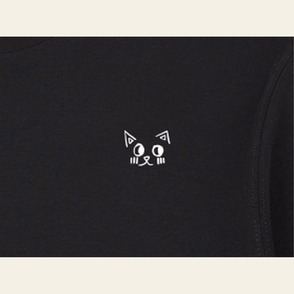 Close-up of the Batce mark printed on the Black long-sleeve t-shirt