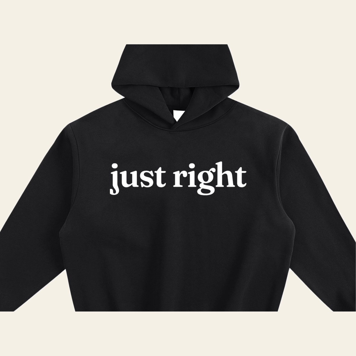 Close-up of the Just Right mark printed on the Black hoodie