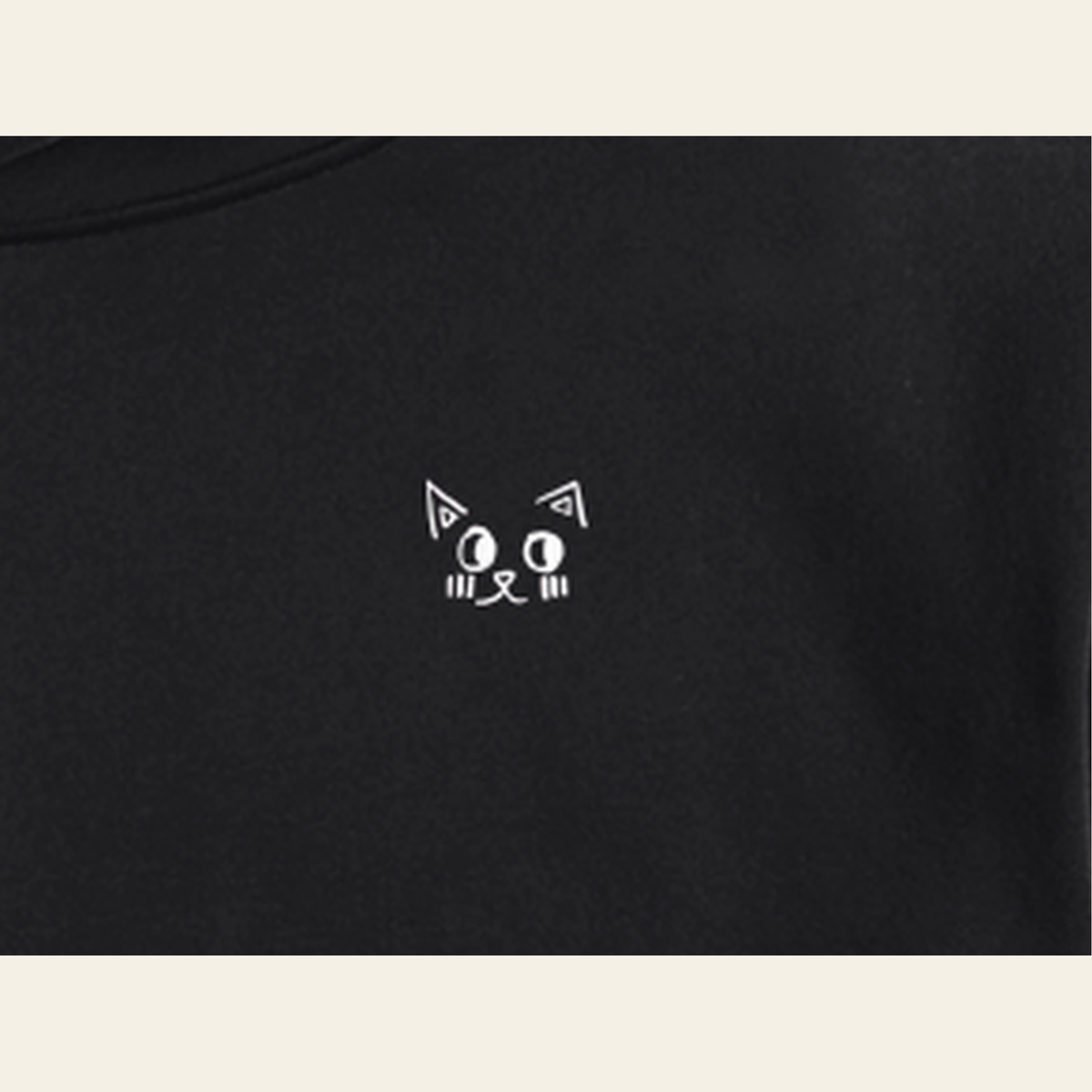 Close-up of the Just Right mark printed on the Black hoodie