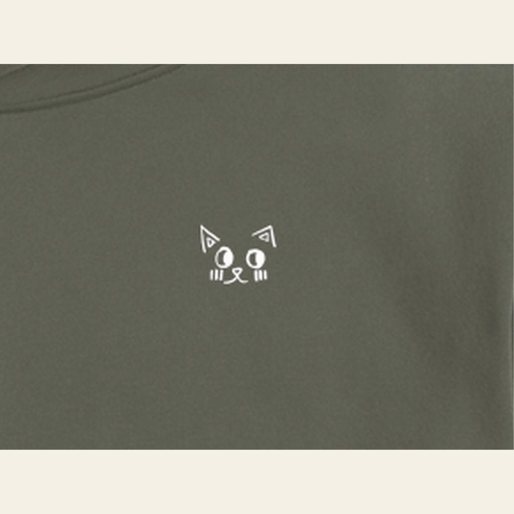 Close-up of the Just Right mark printed on the Olive Gray hoodie