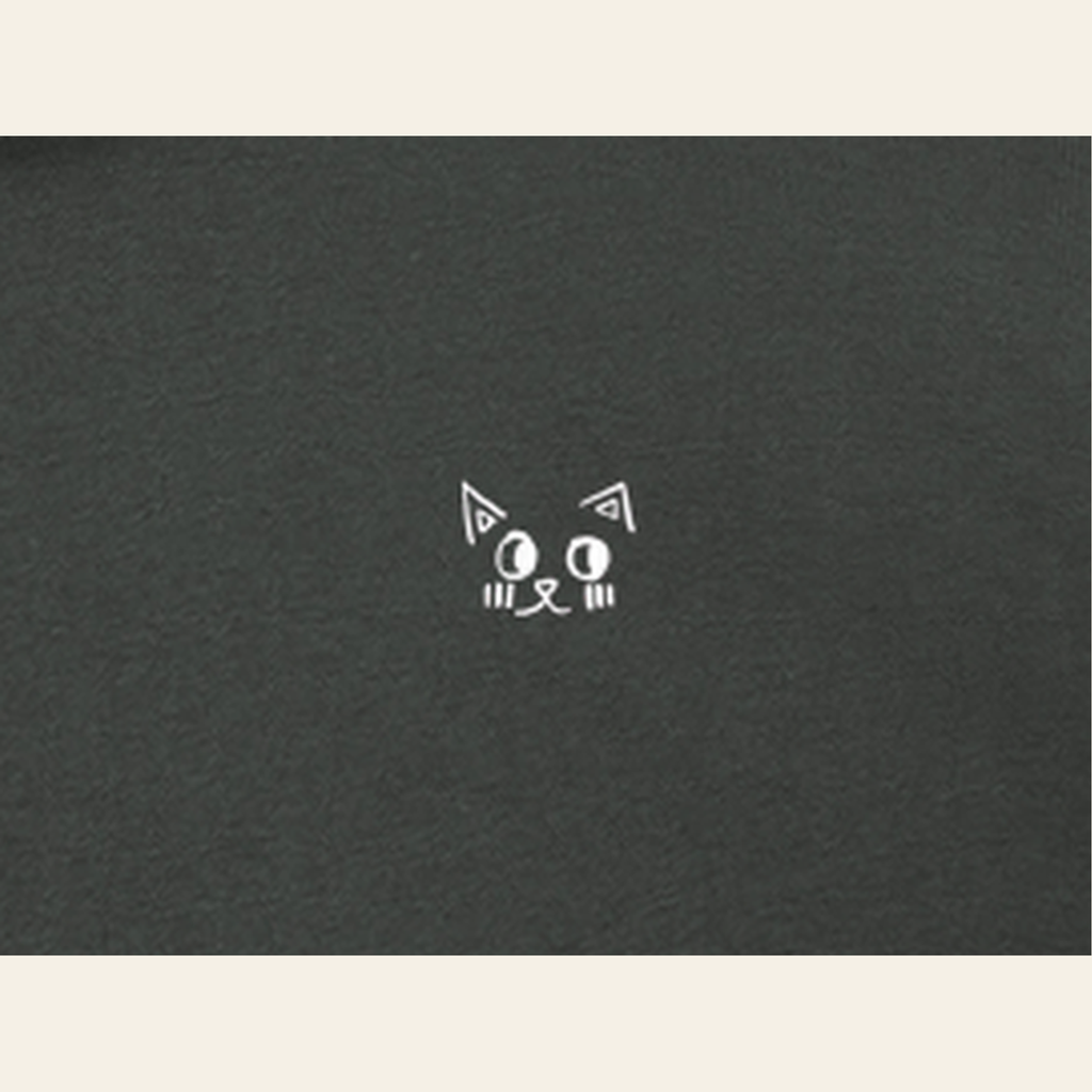 Close-up of the Just Right mark printed on the Dark Gray zip hoodie
