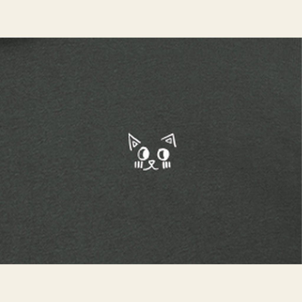 Close-up of the Just Right mark printed on the Dark Gray zip hoodie