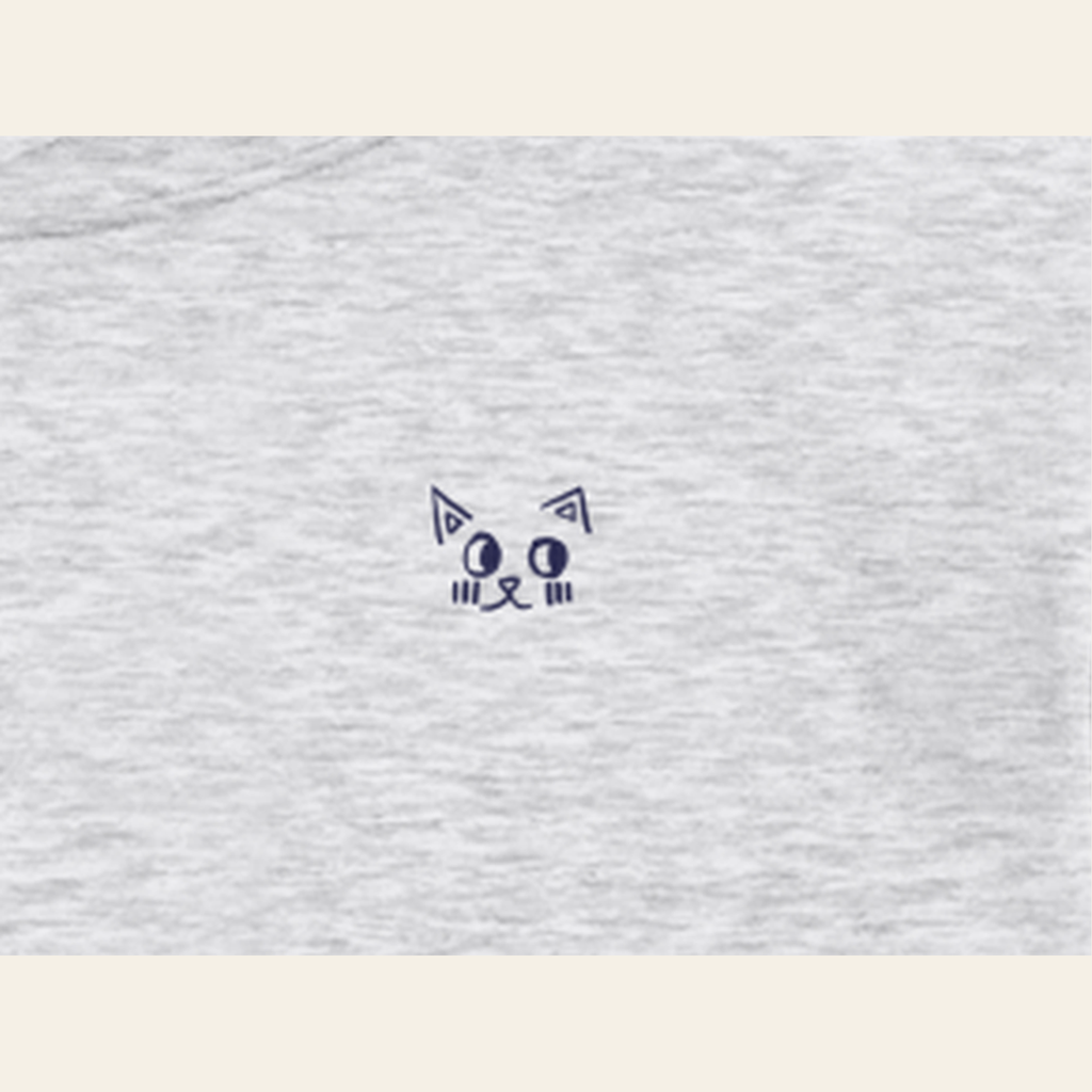 Close-up of the Just Right mark printed on the Heather Gray hoodie
