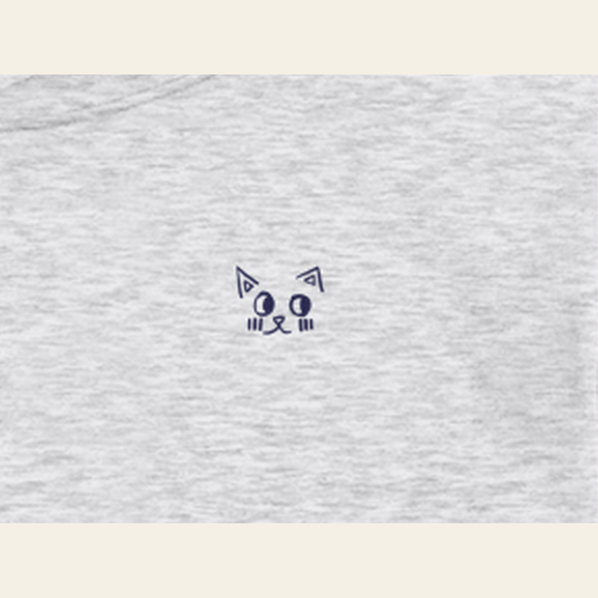 Close-up of the Just Right mark printed on the Heather Gray hoodie