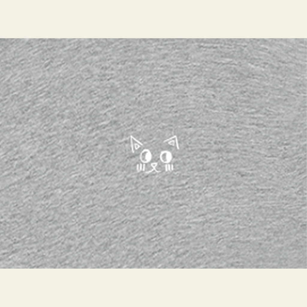 Close-up of the Just Right mark printed on the Heather Gray zip hoodie