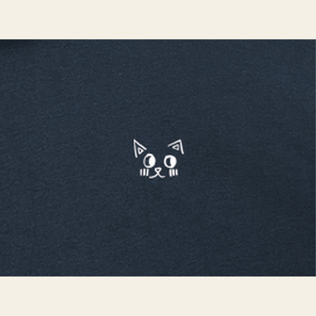 Close-up of the Just Right mark printed on the Navy Blue zip hoodie