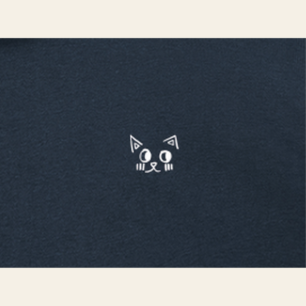 Close-up of the Just Right mark printed on the Navy Blue zip hoodie