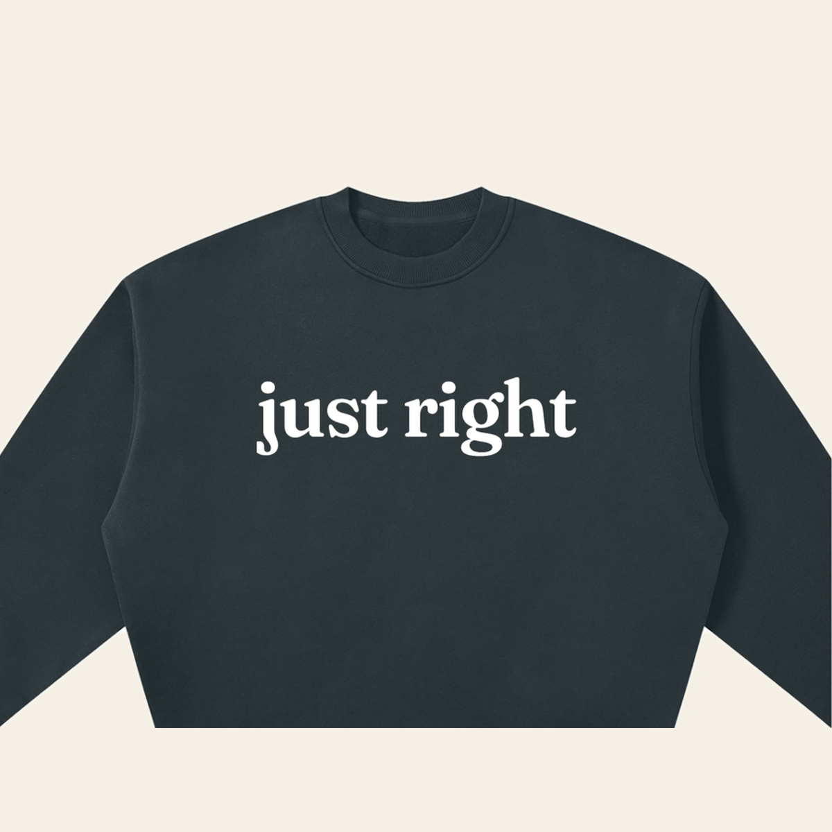 Close-up of the Just Right mark printed on the Navy Blue sweatshirt