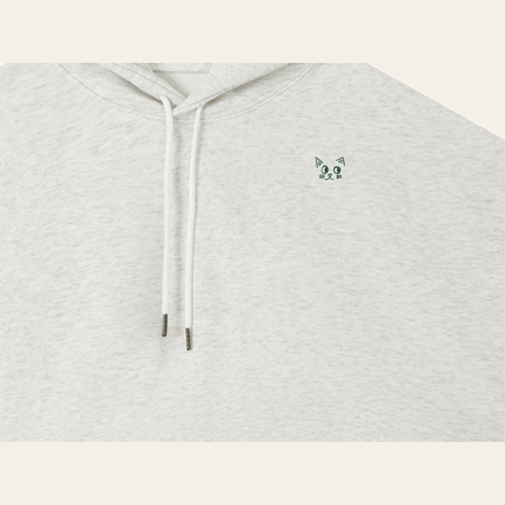 Close-up of the Batce mark printed on the Oatmeal hoodie