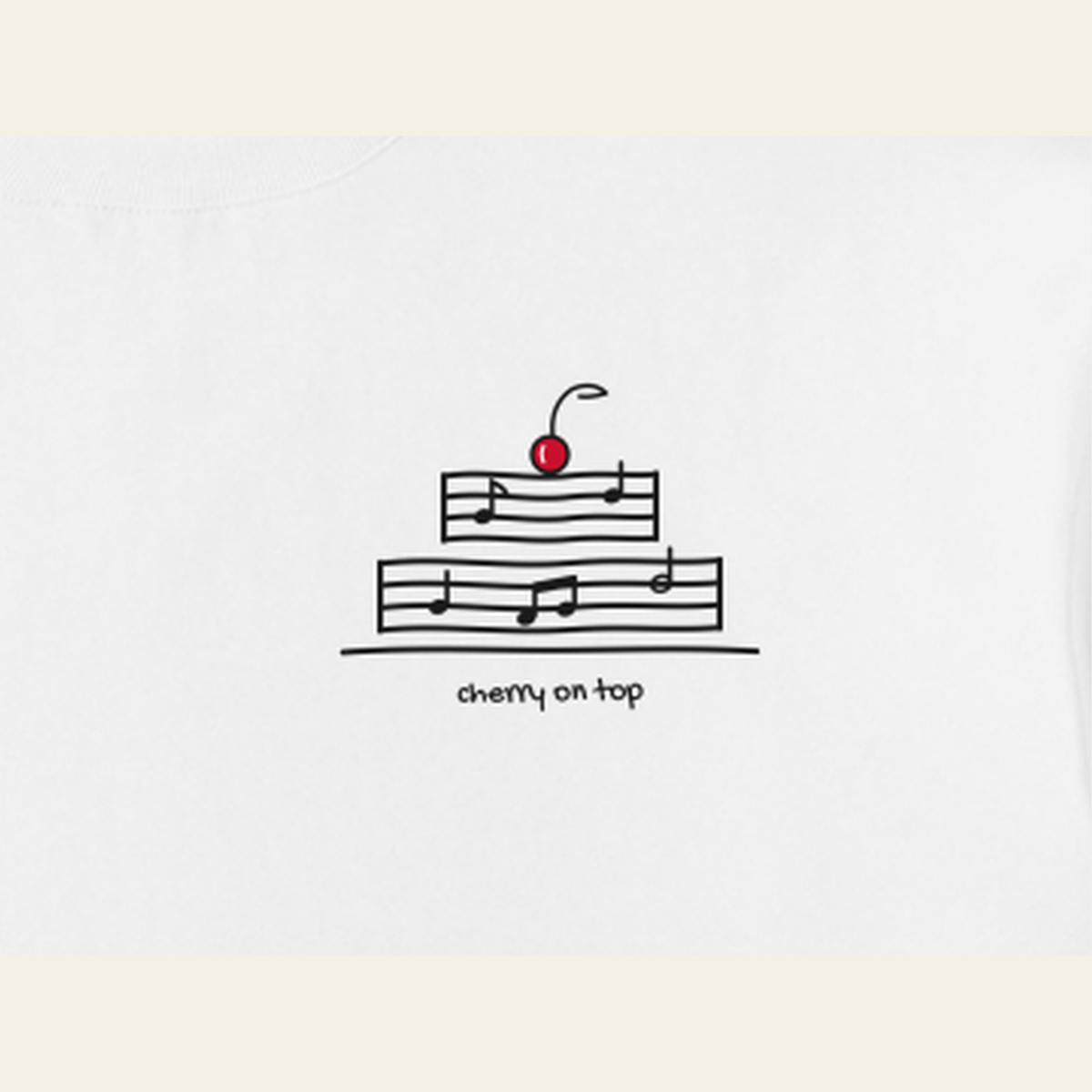Close-up of the Cherry on Top mark printed on the White long-sleeve t-shirt