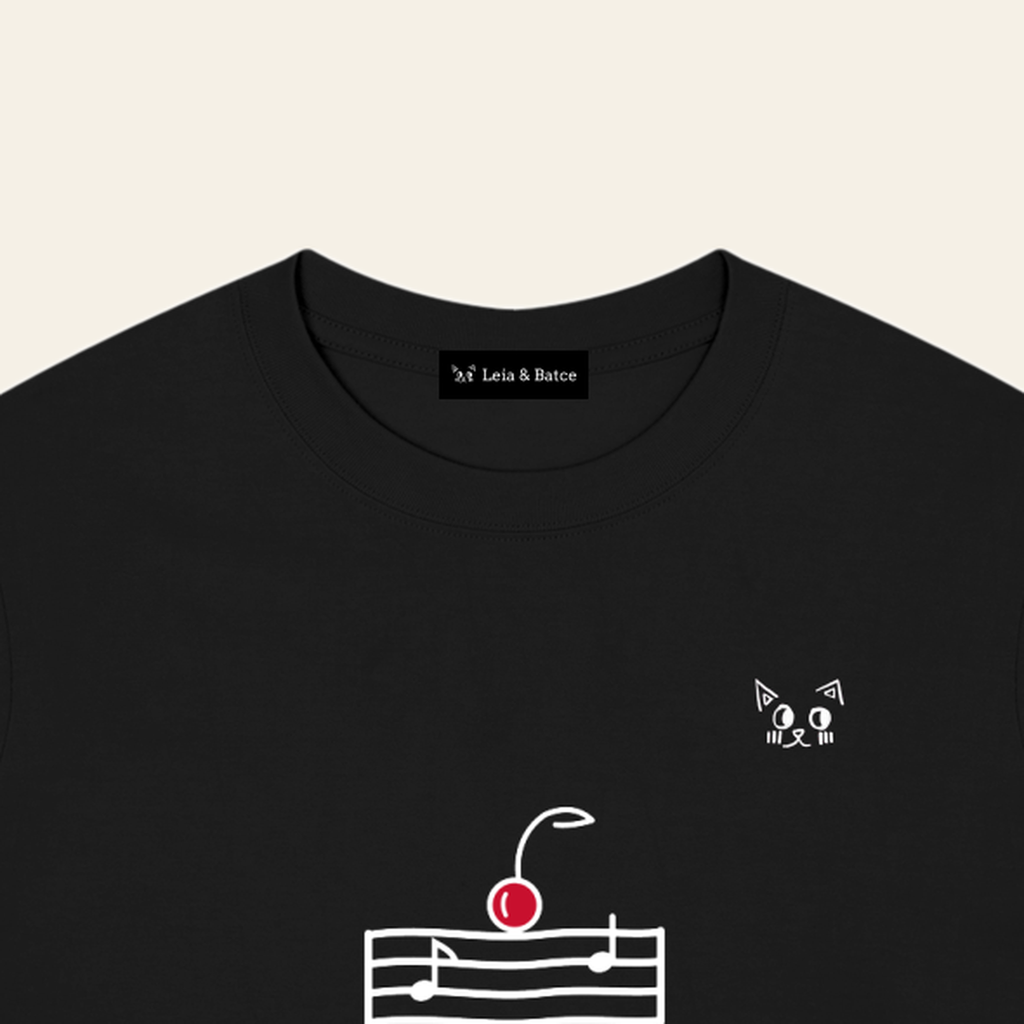 The Leia & Batce label sewn inside the back collar of the Black adult t-shirt