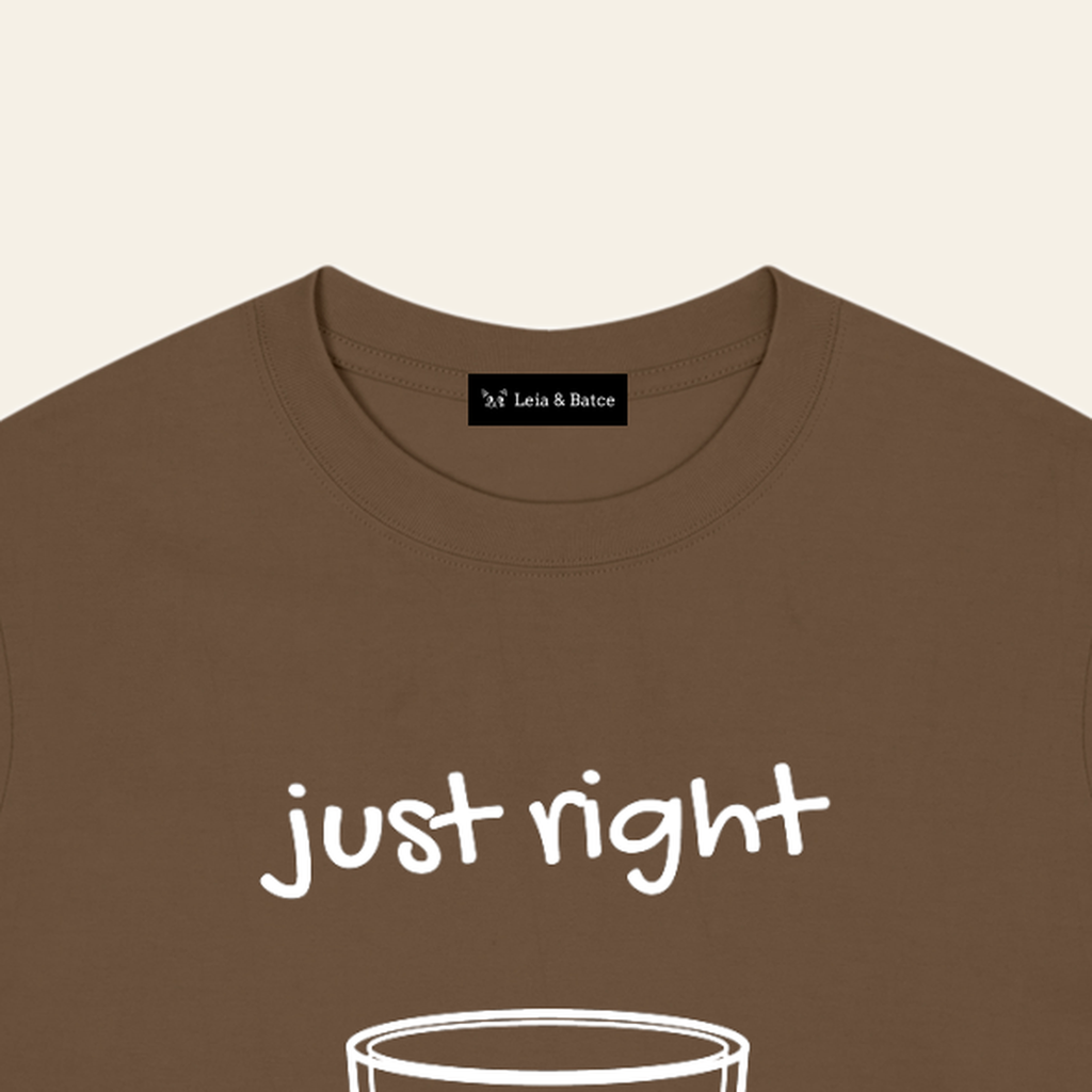 The Leia & Batce label sewn inside the back collar of the Brown adult t-shirt
