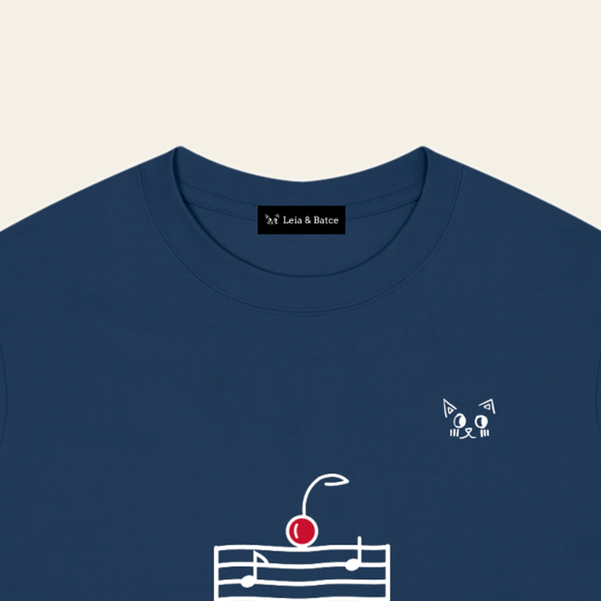 The Leia & Batce label sewn inside the back collar of the Navy Blue adult t-shirt