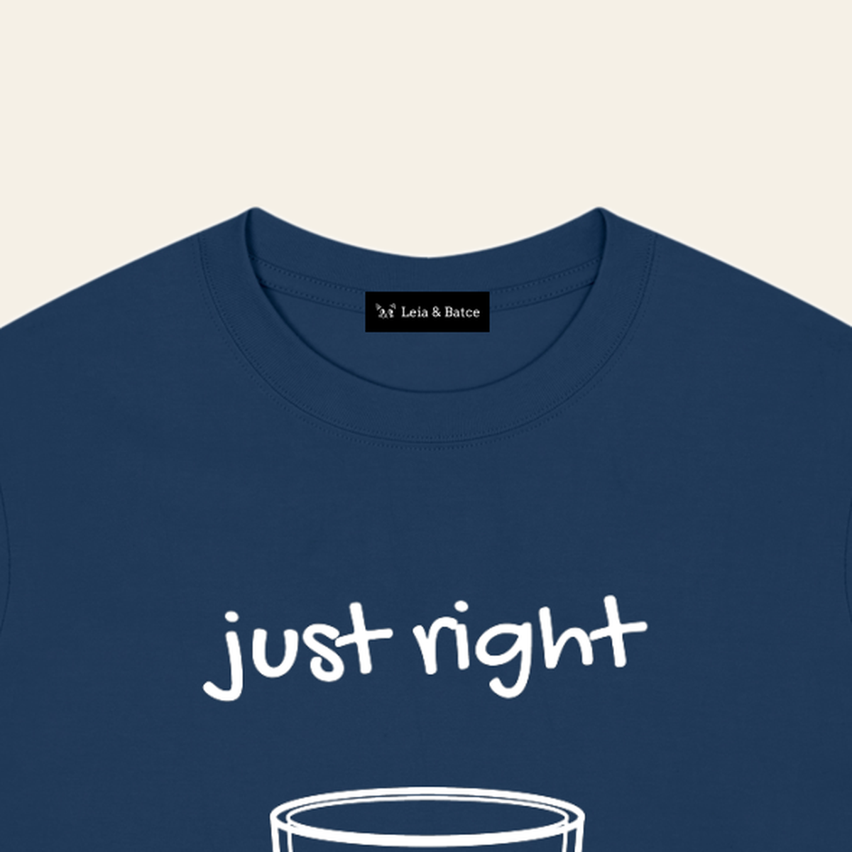 The Leia & Batce label sewn inside the back collar of the Navy Blue adult t-shirt