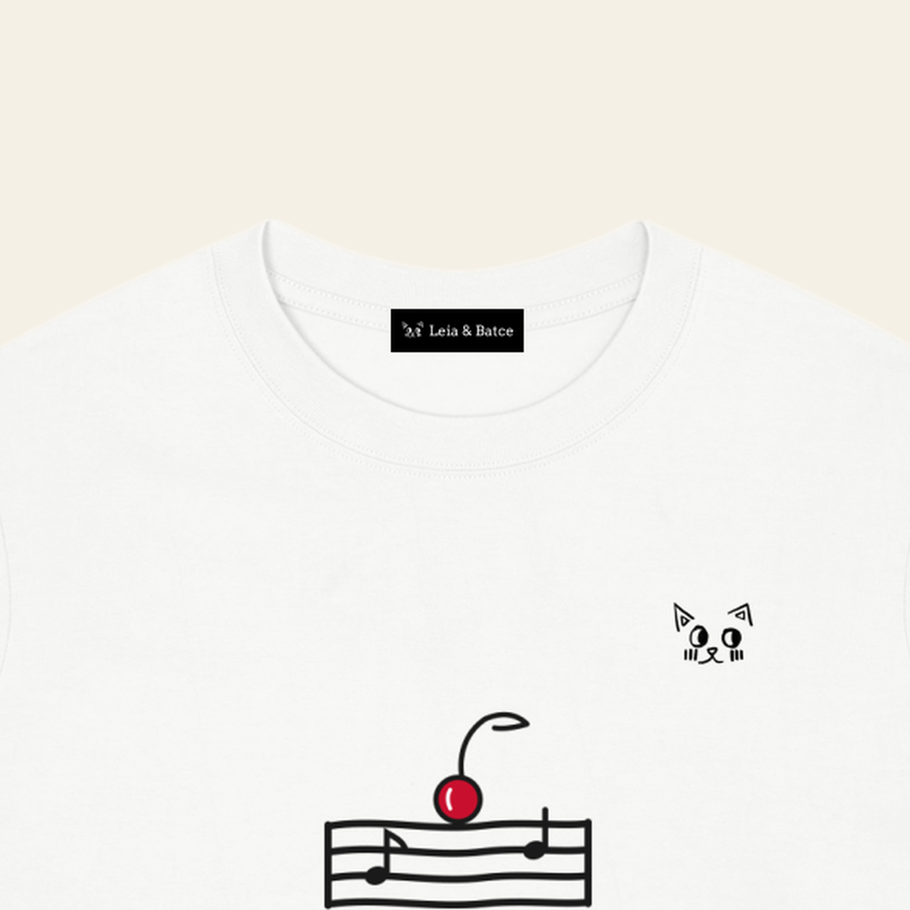 The Leia & Batce label sewn inside the back collar of the White adult t-shirt