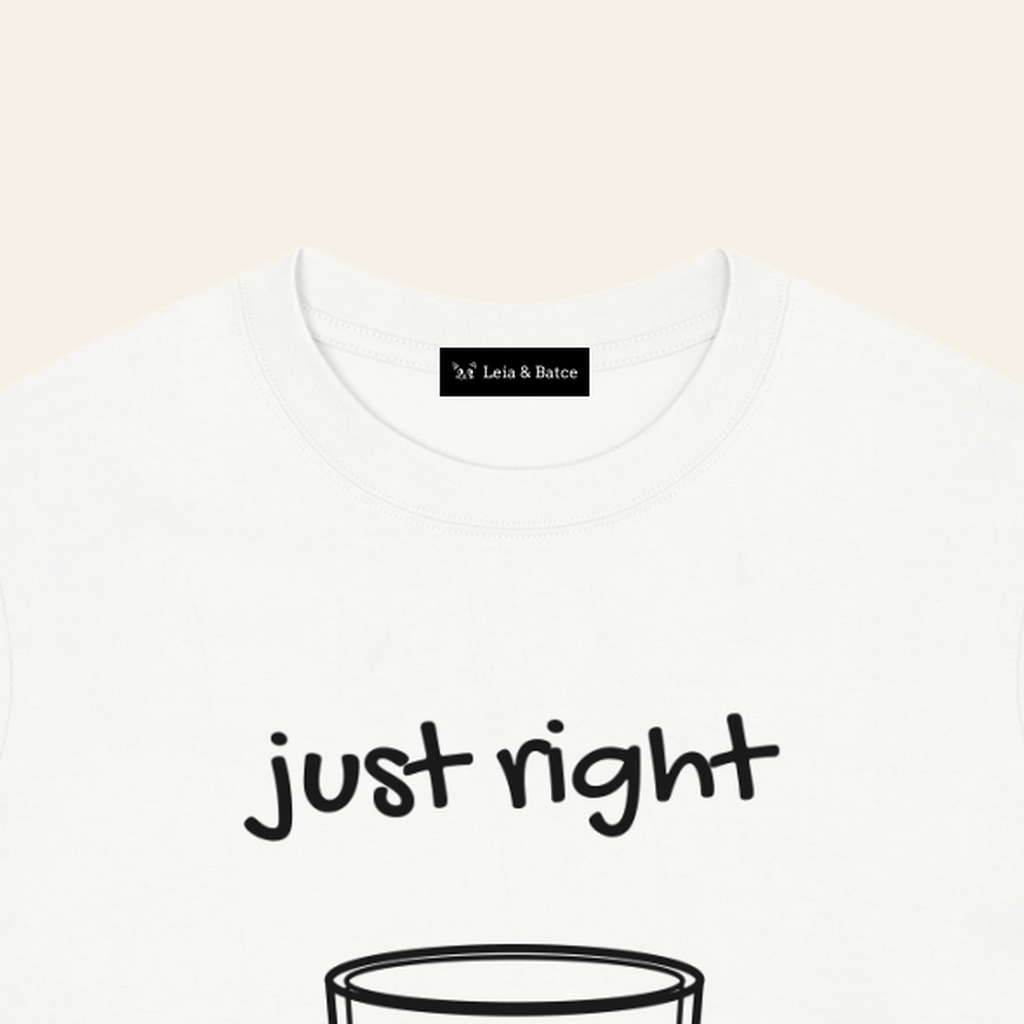 The Leia & Batce label sewn inside the back collar of the White adult t-shirt