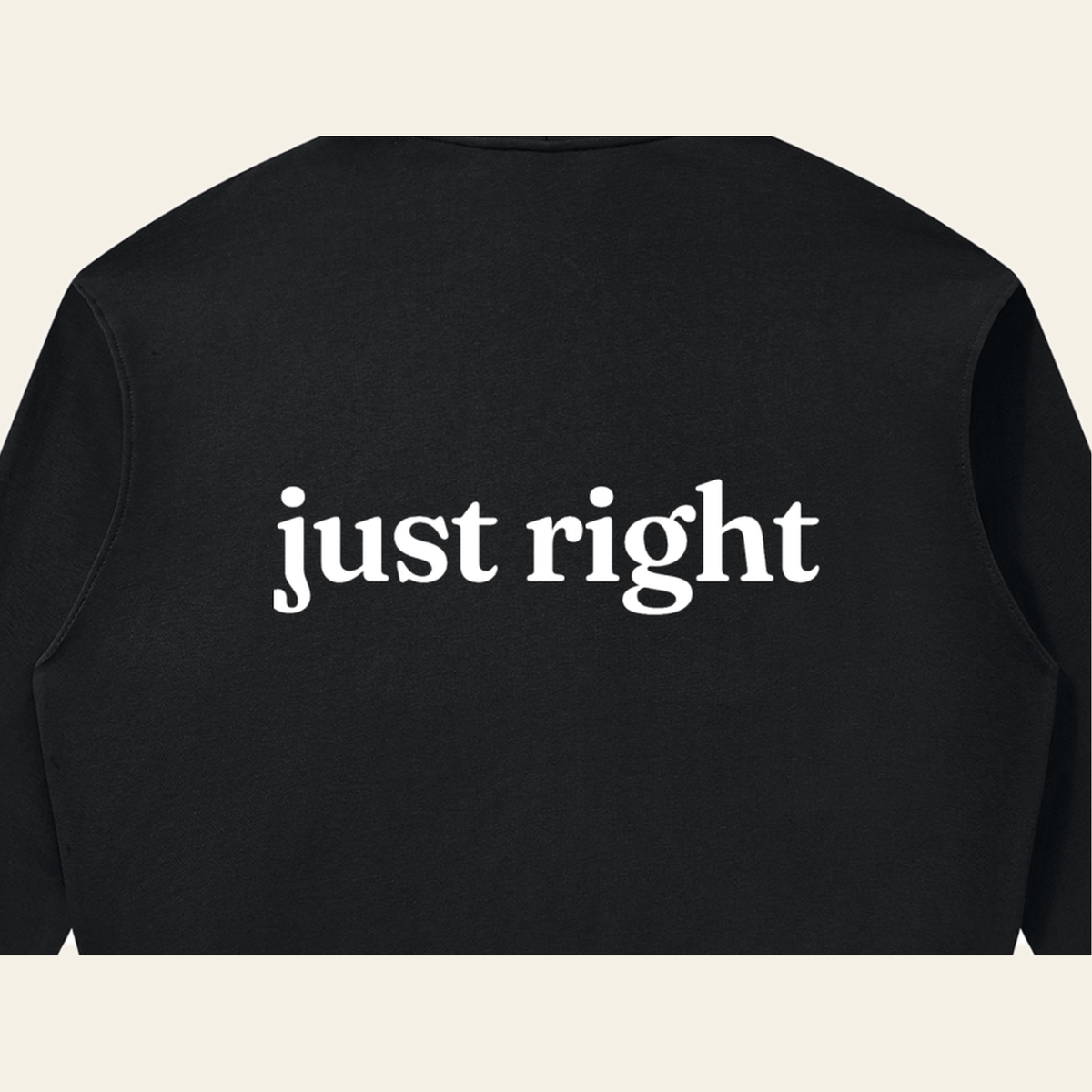 Close-up of the Just Right print on the back of the Black zip hoodie