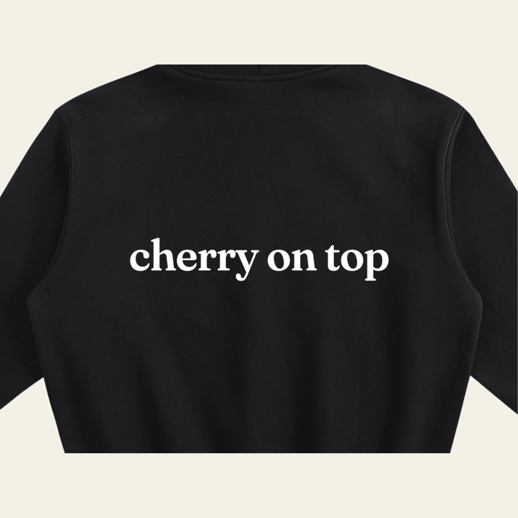 Close-up of the Cherry on Top print on the back of the Black hoodie