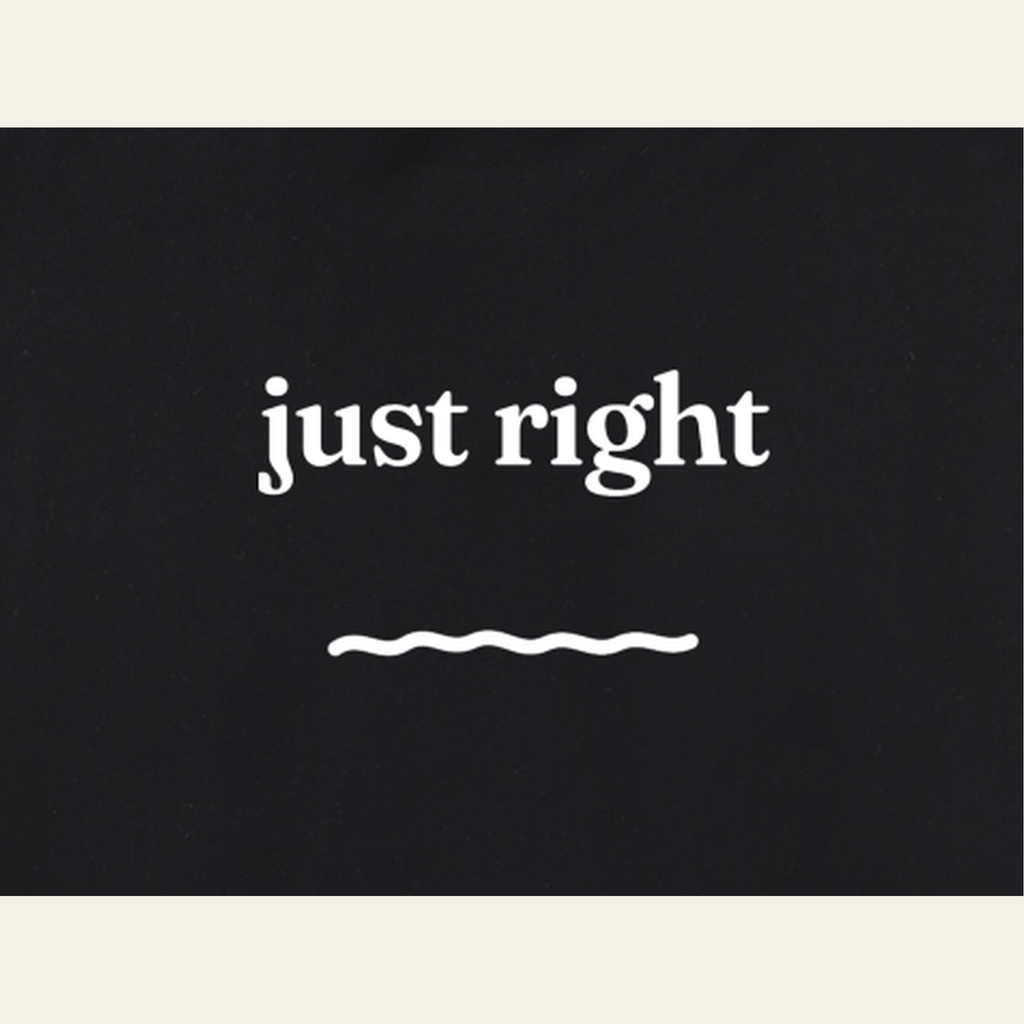 Close-up of the Just Right print on the back of the Black sweatshirt