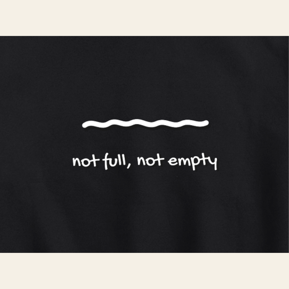 Close-up of the Just Right print on the back of the Black hoodie