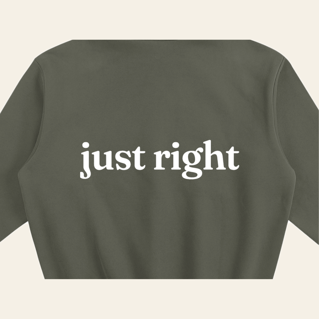 Close-up of the Just Right print on the back of the Olive Gray hoodie