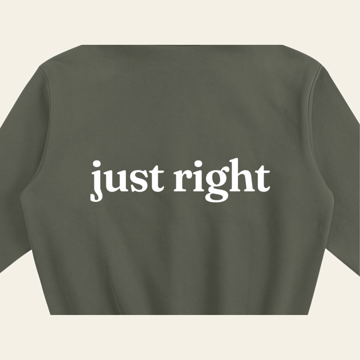 Close-up of the Just Right print on the back of the Olive Gray hoodie