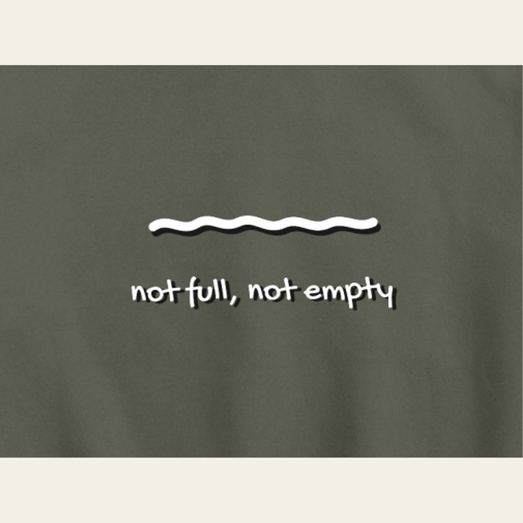 Close-up of the Just Right print on the back of the Olive Gray hoodie