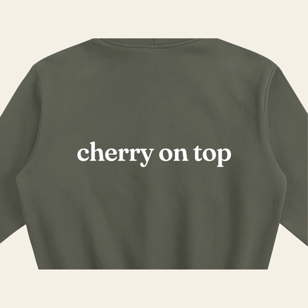 Close-up of the Cherry on Top print on the back of the Olive Gray hoodie