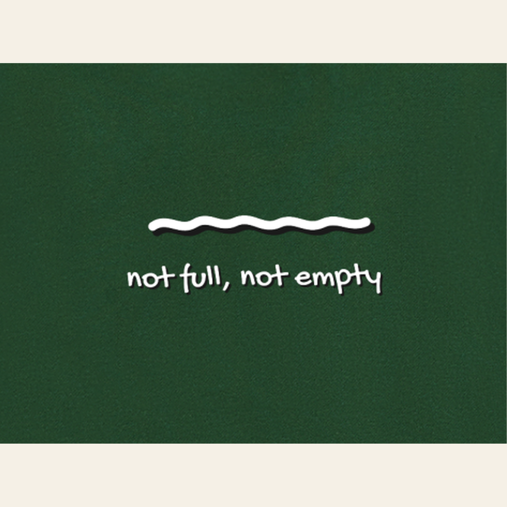 Close-up of the Just Right print on the back of the Dark Green hoodie