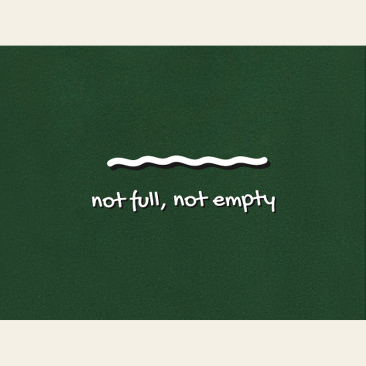 Close-up of the Just Right print on the back of the Dark Green hoodie