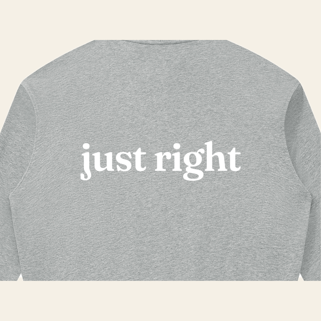 Close-up of the Just Right print on the back of the Heather Gray zip hoodie