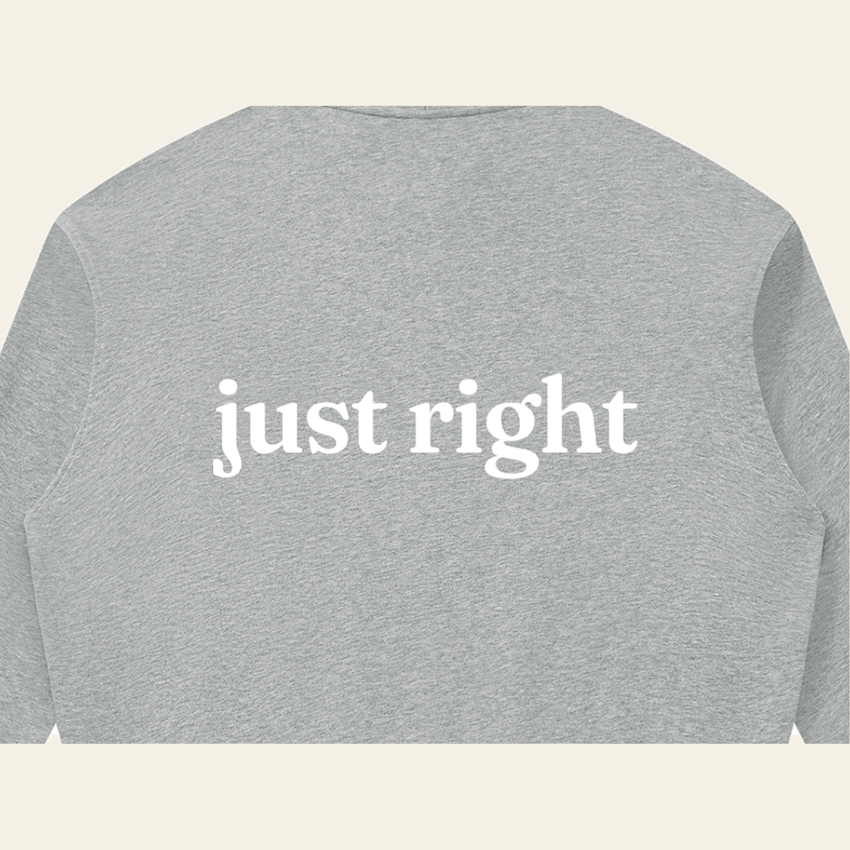 Close-up of the Just Right print on the back of the Heather Gray zip hoodie