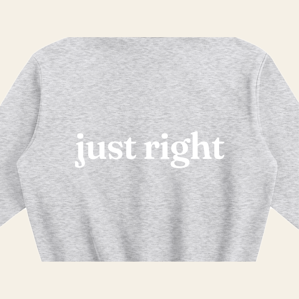 Close-up of the Just Right print on the back of the Heather Gray hoodie