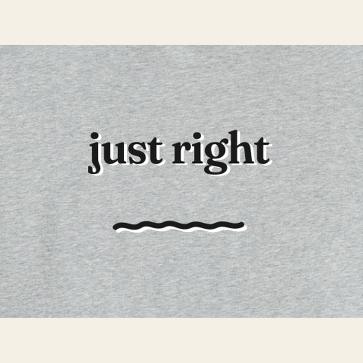 Close-up of the Just Right print on the back of the Heather Gray sweatshirt