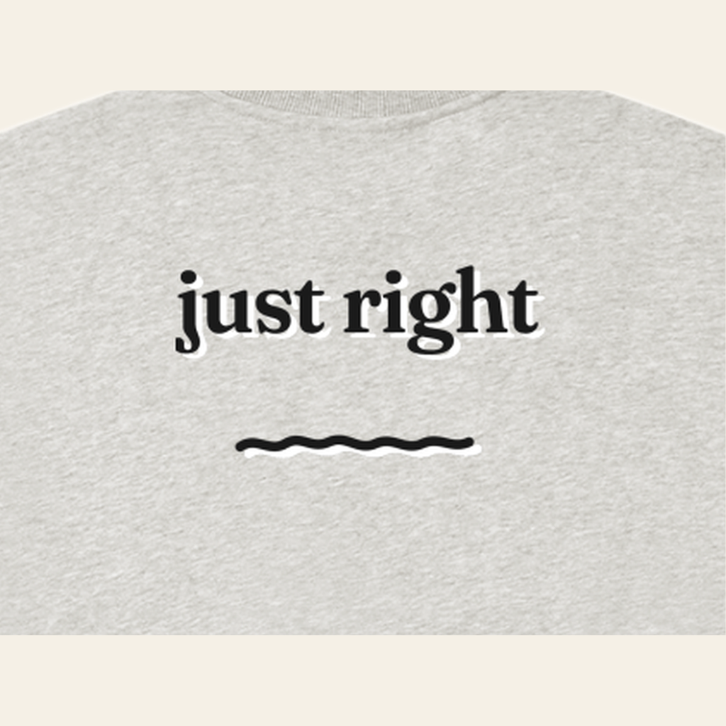 Close-up of the Just Right print on the back of the Heather Gray sweatshirt