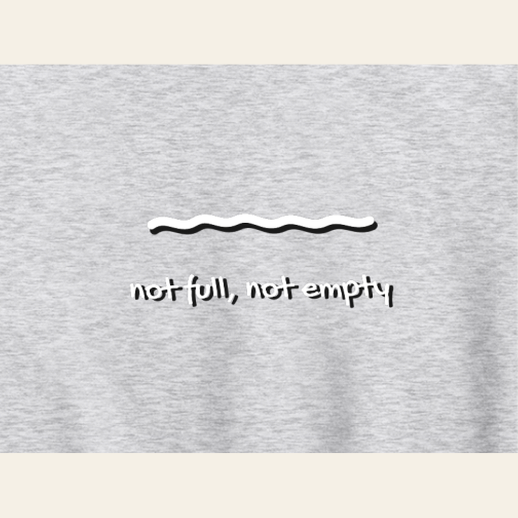 Close-up of the Just Right print on the back of the Heather Gray hoodie