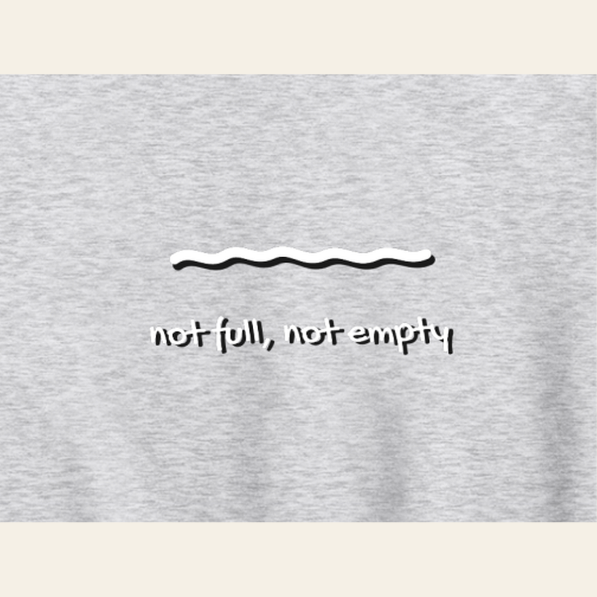 Close-up of the Just Right print on the back of the Heather Gray hoodie