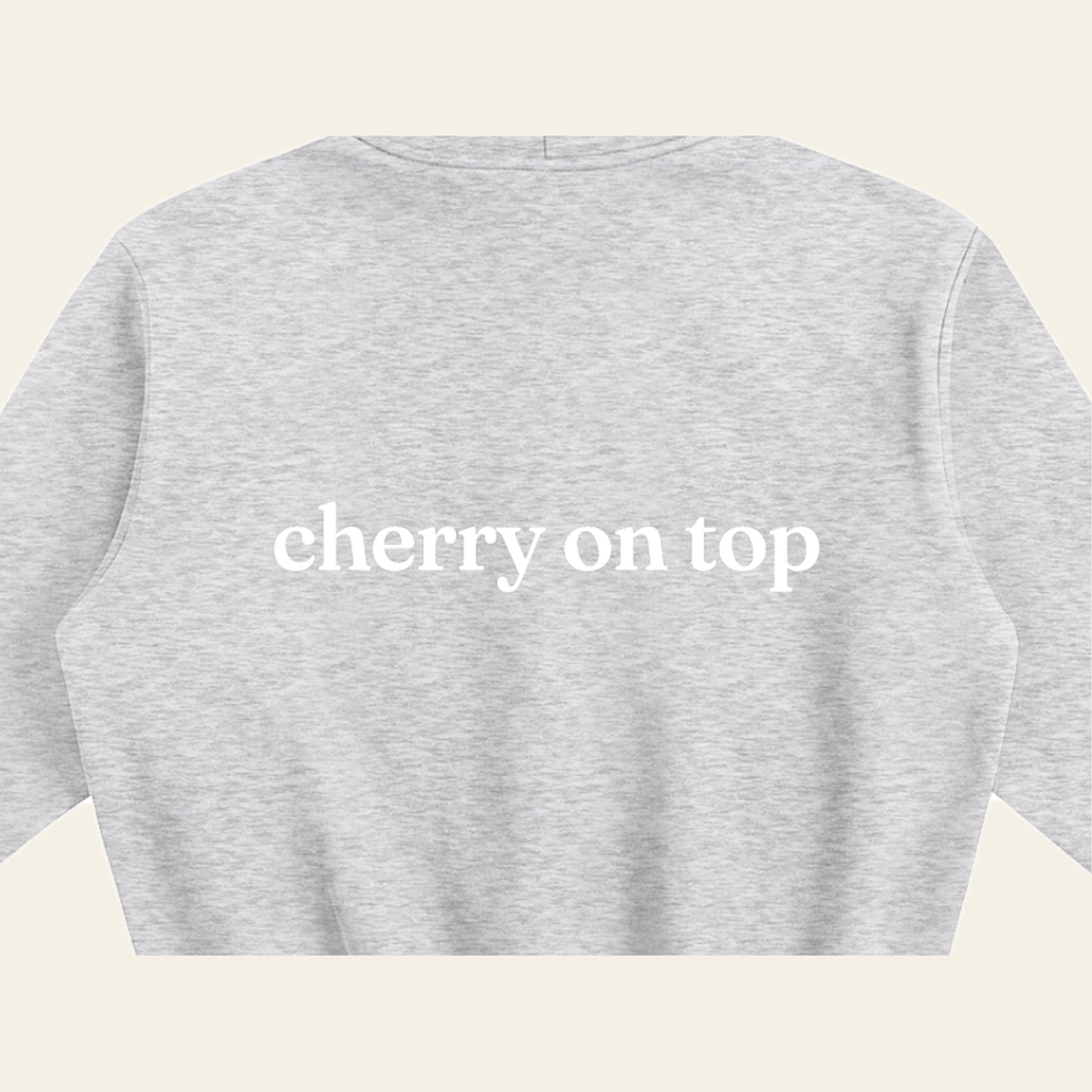 Close-up of the Cherry on Top print on the back of the Heather Gray hoodie