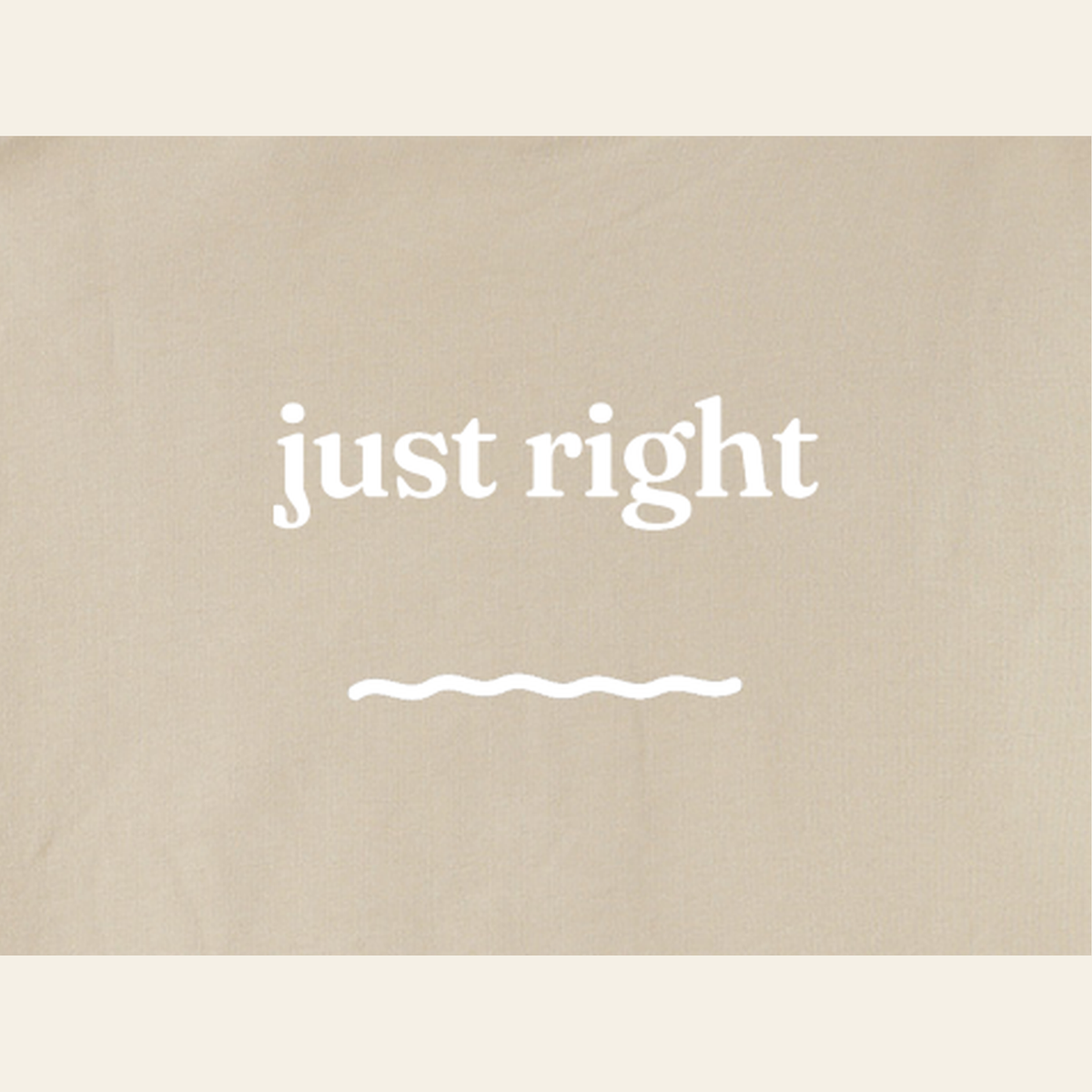 Close-up of the Just Right print on the back of the Khaki sweatshirt