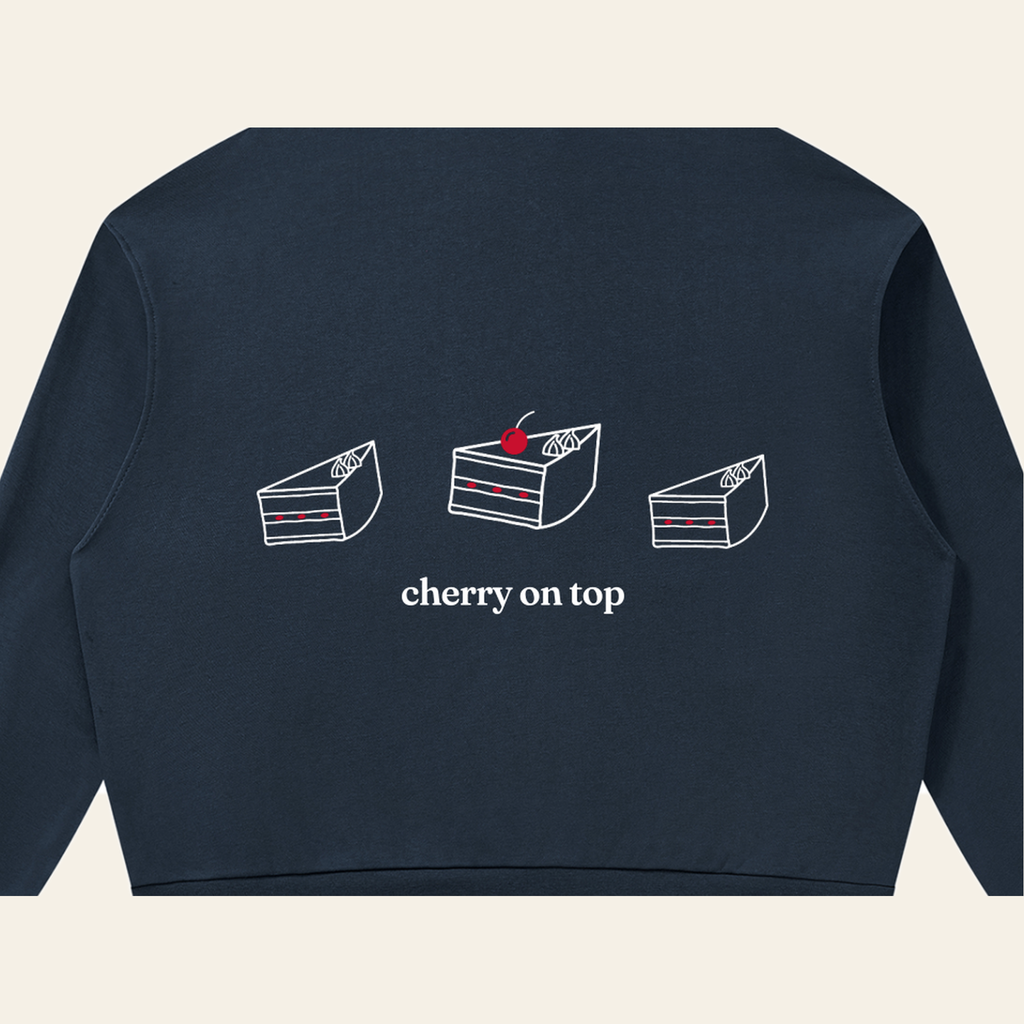 Close-up of the Cherry on Top print on the back of the Navy Blue zip hoodie