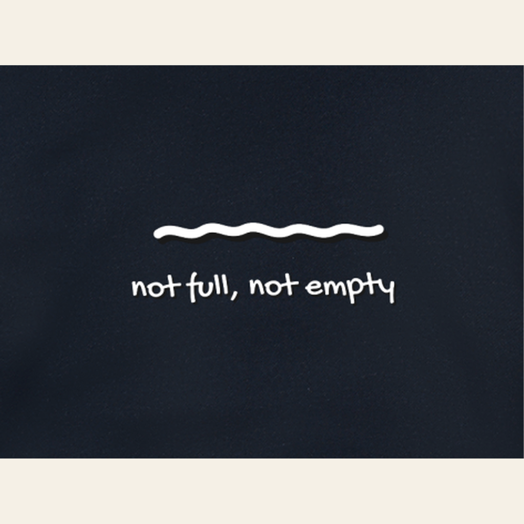 Close-up of the Just Right print on the back of the Navy Blue hoodie
