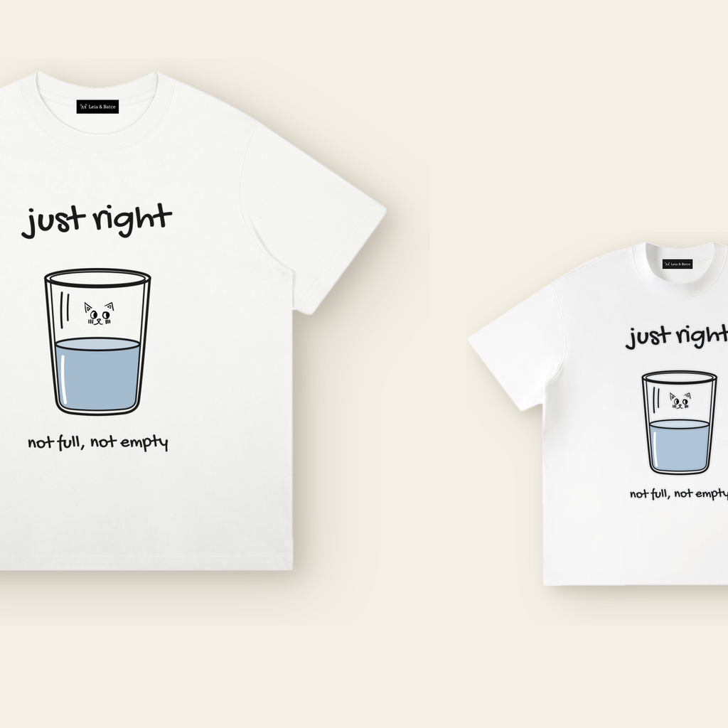 The Just Right T-Shirt in adult and kids sizes side by side, the same mark drawn to scale for each