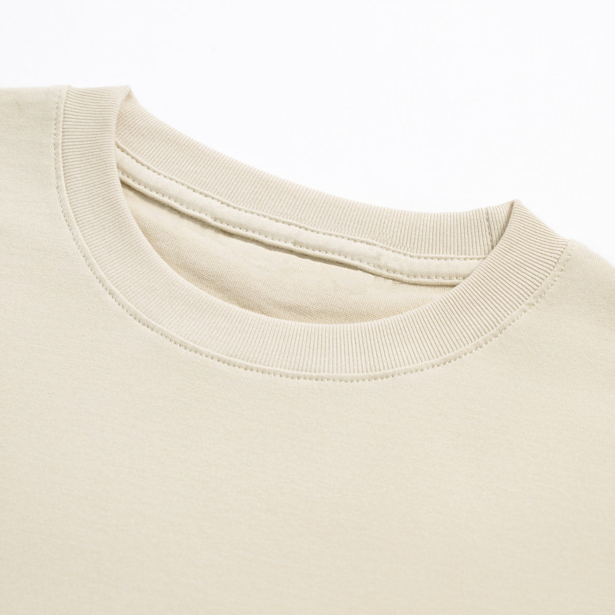 Just Right Small Long Sleeve T-Shirt – Kids: garment detail, no print — the long-sleeve t-shirt itself up close in Peach (Tapstitch sample photo 1 of 4)