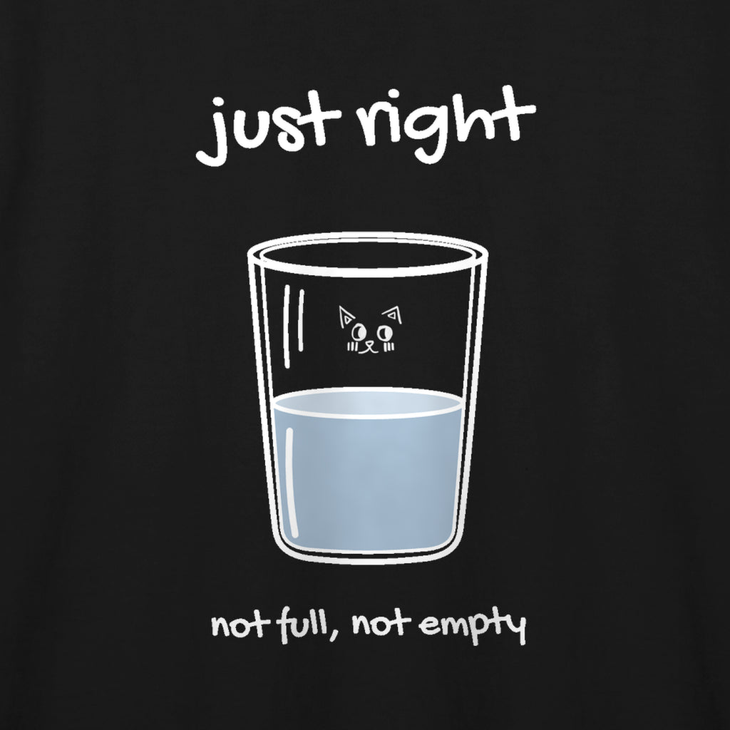 Close-up of the hand-drawn Just Right mark printed on the Black adult t-shirt